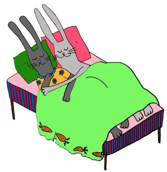 Cartoon Rabbits in bed - snug as a bug in a rug